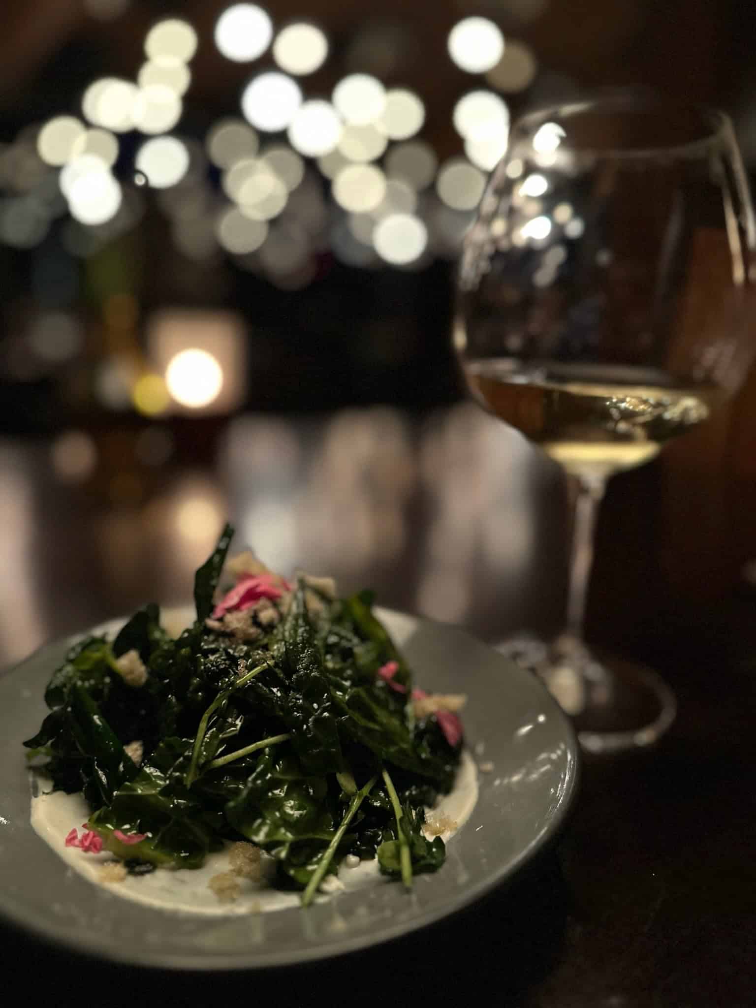 A salad and glass of wine at Che Ah Chi in Sedona