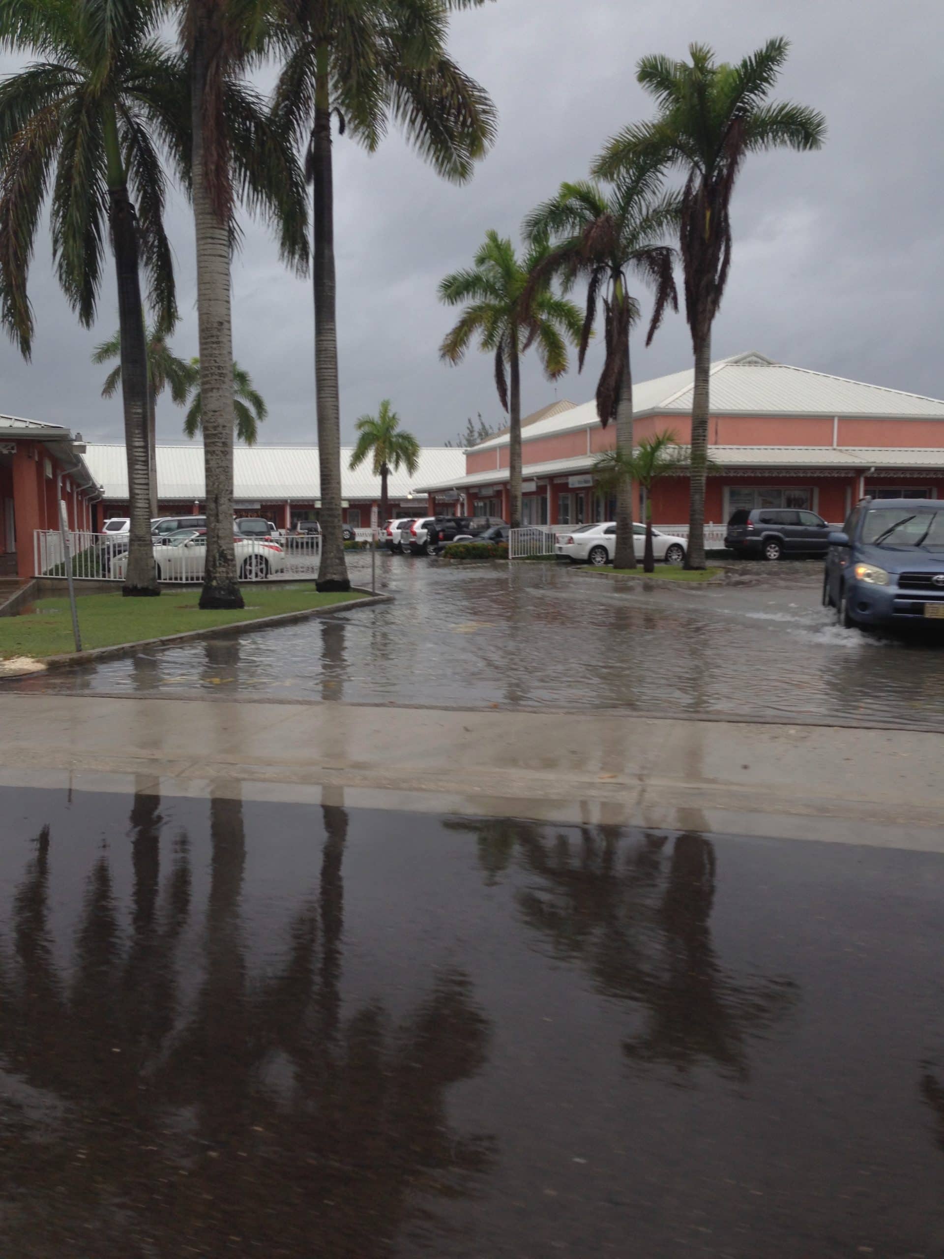 A flooded parking lot after heavy rains in George Town Grand Cayman