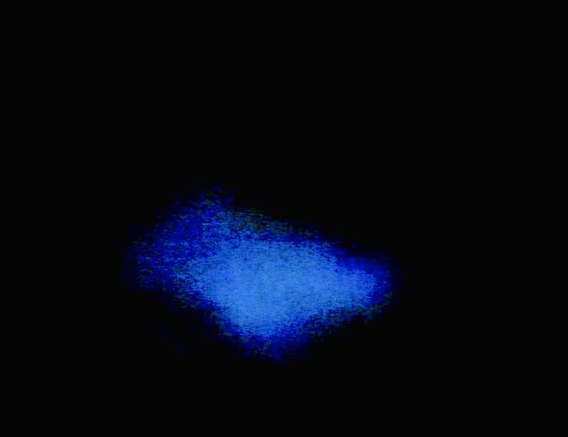 Plankton glowing in the water in Bioluminescent Bay, Grand Cayman