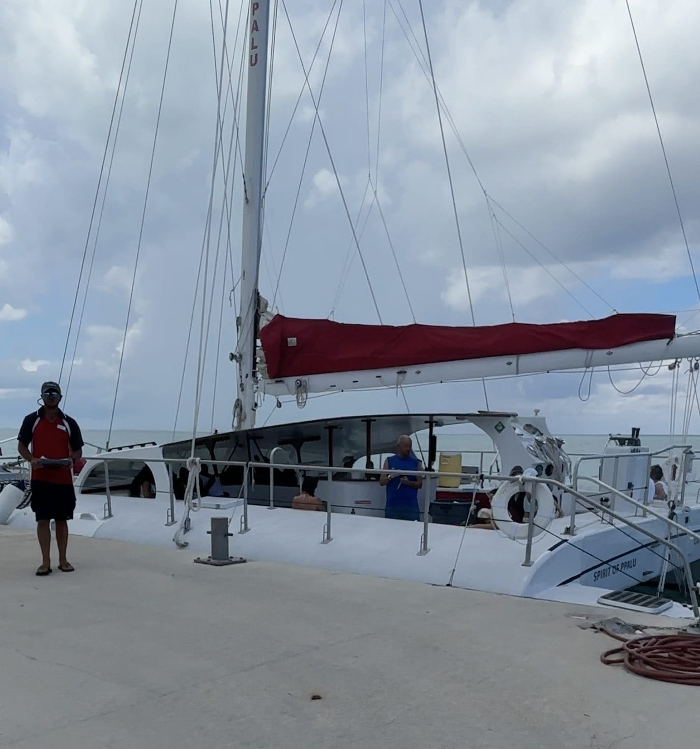 Red Sail Sports catamaran docked at Rum Point as it's getting ready to depart for a tour
