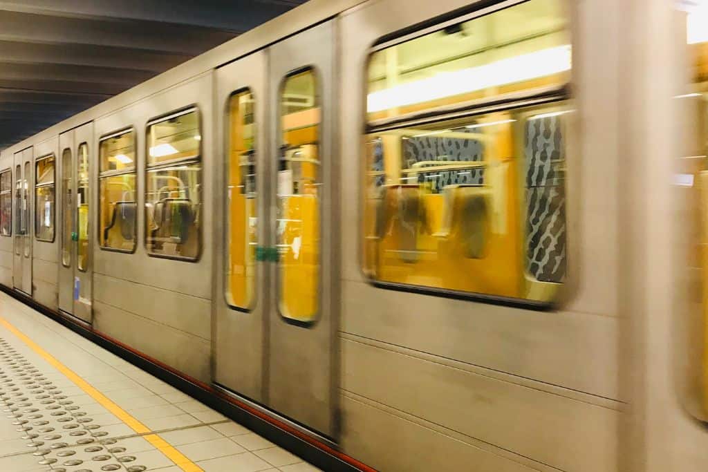A train leaving an underground station.